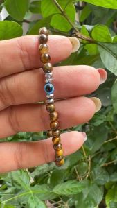 พลังปกป้องอันทรงพลัง – สร้อยข้อมือตาแมวกับหินตาเสือ ขนาด 4 มม พร้อมส่ง