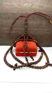 Tasbih tijani kayu kelor emas model bulat benang rajut