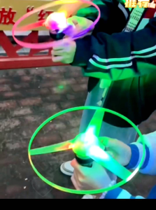LED Flying Toy Pull Rope UFO Spinner Light Up Kids Toy