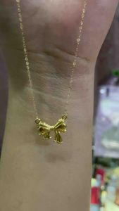 PAWNABLE 18K Saudi Gold Centered Stylish-Ribbon Necklace(lightweight open back pendant))✨