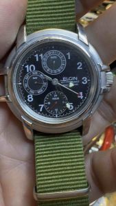 Đồng hồ nam hiệu ELGIN QUARTZ size 435mm 1 cốt 6 kim kim hai lịchkim 24h lỗi kim date không nhảy siêu chống nước 200m với đáy xoáy và núm vặn dây dù linh kiện dáng độc lạ