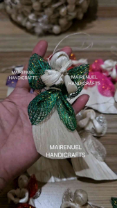 Native Christmas Angels with colored mesh wings and white bodies for festive decoration.