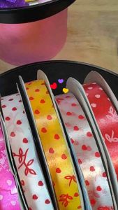 ริบบิ้นพิมพ์ลาย บำรุง 2 ลายหัวใจเล็ก ริบบิ้นพับเหรียญโปรยทาน ห่อเหรียญ (12 ม้วน) 12 มิล X 50 หลา