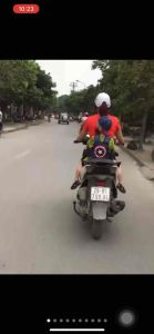 Đai xe máy cho bé Đai địu em bé đi xe máy