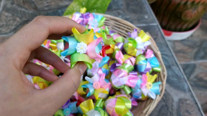 พร้อมส่ง เหรียญโปรยทานถุงรวยทรัพย์หลากสี สีสันสดใส 50ตัว(ตัวเปล่า) 189บาท