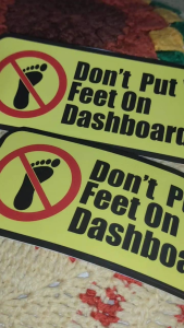 Vinyl Waterproof STICKER ONLY glossy sticker rectangular sign with black border. Black text reads "Dont Put Your Feet On Dashboard." size: 3.5 x 7.75inches long