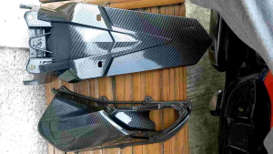 Spakbor Belakang & Tutup Filter PCX 160 Karbon