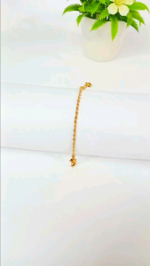 Gelang tangan titanium gulir Arti karat