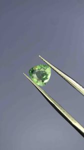 0.75 กะรัต | ทัวร์มาลีนสีเขียว | 6.5x2.9มม. | ทรงทริลเลี่ยน | 0.75 carats | Green Tourmaline | 6.5x2.9mm | Trillion Shape