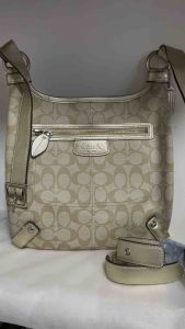 Like new authentic signature PVC sling bag