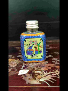 ยาหม่องน้ำ สกัดจากน้ำมันส้ม 30g (แถมถุงผ้าลายไทย)