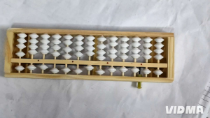 1314 Wood abacus with white beads for learning and education.