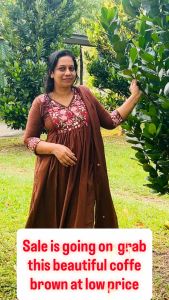 Brown embroidered mulcotton dress with matching dupatta. Three-quarter sleeves. V-neckline. Suitable for office wear and temple wear.top with pockets