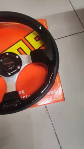 Momo Black Steering Wheel Universal Fit for Various Vehicles Enhances Driving Experience