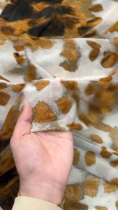 Voan thun lưới họa tiết trắng đen xinh xắn . Chất thun co giãn tốt. Khổ vải 15m