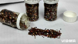 Star dust glitter star shape 50gsm - clear jars with white lids - art craft supply - scattered glitter on surface