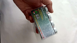 Kitab Hijib Bahri dalam kemasan botol kaca ples