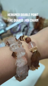 LITTLE D FIRE QUARTZ NATURAL CRYSTAL BRACELET with edgy heart centerpiece featuring brown and clear beads silver accents and a silver charm.