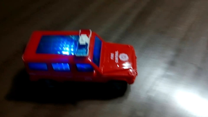 Đồ chơi xe cảnh sát có nhạc đèn và tự động tiến lùi tránh chướng ngại vật