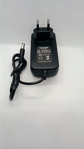 Adaptor POLYTRON Model : GM 42-090300-2A 9.0V -- 3.0A : 27.0W.