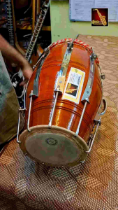Standard Dholak with Bag and Spanner Traditional Indian Drum Wooden Body Metal Tension Rods Beige Drumhead Blue Cushion Stand