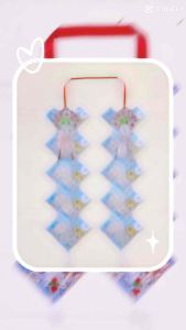 พวงมาลัยใส่ธนบัตร 20 ใบ ลายหัวใจตรง ริบบิ้นผ้าซาตินคาดดิ้น (**ซองใสใส่ได้ทุกแบงค์**) >>...มีของพร้อมส่ง...<<