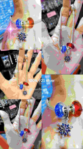 Pan Dora 925 silver bracelet with blue and red charms and snowflake pendant.