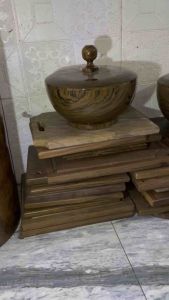 Wooden rice or salad bowls with lids polished finish suitable for serving displayed on tiled surface.