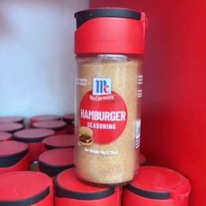 McCormick Hamburger Seasoning 78g bottle - red cap - clear container - spice blend - stack of bottles