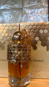 Maison Margiela By the Fireplace Honey Perfume Bottle with Bee Design on Golden Cap and Honeycomb Patterned Body
