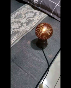 Small but mighty lamp light from Thailand coconut shell natural
