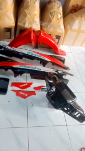 COVER BODI SET SPAKBOR SLEBOR DEPAN DAN BATOK ATAS BAWAH YAMAHA FORCE1 F1Z SET STIKER\\n\\n Apa Itu Cover Bodi Set Spakbor Slebor Yamaha Force1?\\n\\nCover bodi set spakbor slebor Yamaha Force1 adalah aksesoris yang dirancang khusus untuk motor Yamaha F1Z. Komponen ini mencakup cover bodi depan dan belakang, serta spakbor dan slebor yang ditempatkan pada bagian atas dan bawah motor. Cover bodi set spakbor slebor Yamaha Force1 memiliki fungsi utama untuk melindungi motor dari kerusakan fisik dan meningkatkan penampilan estetika.\\n\\n Fungsi Cover Bodi Motor Sport\\n\\nCover bodi motor sport memiliki beberapa fungsi penting, antara lain:\\n\\n- Melindungi motor dari goresan dan benturan saat berjalan di jalan raya atau parkir.\\n- Meningkatkan penampilan estetika motor, sehingga membuatnya tampak lebih menarik.\\n- Mengurangi hambatan udara saat motor bergerak, sehingga meningkatkan efisiensi bahan bakar dan kecepatan.\\n\\n Kelebihan Menggunakan Cover Bodi Set Spakbor Slebor Yamaha Force1\\n\\nAda beberapa kelebihan yang dapat Anda peroleh dengan menggunakan cover bodi set spakbor slebor Yamaha Force1, antara lain:\\n\\n- Melindungi motor dari kerusakan fisik, seperti goresan dan benturan.\\n- Meningkatkan penampilan estetika motor, sehingga tampak lebih menarik.\\n- Meningkatkan efisiensi bahan bakar dan kecepatan motor.\\n\\n Cara Menginstal Cover Bodi Set Spakbor Slebor Yamaha Force1\\n\\nBerikut adalah langkah-langkah untuk menginstal cover bodi set spakbor slebor Yamaha Force1:\\n\\n1. Siapkan alat yang diperlukan, seperti obeng, pemotong kertas, dan lem.\n2. Bersihkan area instalasi dengan menggunakan kain basah.\n3. Pasang cover bodi depan dan belakang pada motor.\n4. Pasang spakbor dan slebor pada bagian atas dan bawah motor.\n5. Periksa kembali instalasi dan pastikan semua komponen terpasang dengan baik.\\n\\n Aksesoris Motor Yamaha F1Z Lainnya\\n\\nSelain cover bodi set spakbor slebor Yamaha Force1, ada beberapa aksesoris lain yang dapat Anda gunakan untuk meningkatkan penampilan dan kinerja motor Yamaha F1Z, antara lain:\\n\\n- Stiker depan dan batok atas bawah\\n- Perlengkapan modifikasi motor\\n\\n Tips Memilih Cover Bodi Set Spakbor Slebor Yamaha Force1\\n\\nBerikut adalah beberapa tips penting yang harus Anda pertimbangkan saat memilih cover bodi set spakbor slebor Yamaha Force1:\\n\\n- Pilih cover bodi set spakbor slebor Yamaha Force1 yang memiliki kualitas tinggi dan tahan lama.\\n- Perhatikan desain dan warna cover bodi set spakbor slebor Yamaha Force1 yang sesuai dengan selera Anda.\\n- Pastikan penjual yang Anda pilih memiliki reputasi baik dan menawarkan garansi produk.\\n\\n Kesimpulan\\n\\nCover bodi set spakbor slebor Yamaha Force1 adalah aksesoris yang dapat melindungi motor dari kerusakan fisik dan meningkatkan penampilan estetika. Dengan memilih cover bodi set spakbor slebor Yamaha Force1 yang tepat, Anda dapat meningkatkan kinerja motor Yamaha F1Z dan membuatnya tampak lebih menarik. Penting untuk memilih aksesoris motor yang berkualitas tinggi dan sesuai dengan selera Anda, serta memperhatikan penjual yang dapat dipercaya untuk memastikan Anda mendapatkan produk yang berkualitas.\\n\"\n}