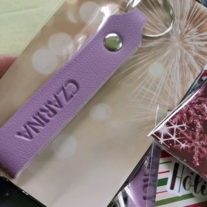 personalized keychain with backing and plastic packaging