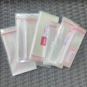 OPP plastik kantong dengan seal lem ukuran 3-8cm isi 100pcs