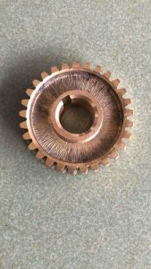 Nhông đồng trong đầu xới gắn máy cắt cỏ