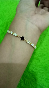 Gelang Serut Vancleef Bunga Hitam 02 Gram\\n\\n Apa Itu Gelang Serut Vancleef Bunga Hitam 02 Gram?\\n\\nGelang Serut Vancleef Bunga Hitam 02 Gram adalah sebuah perhiasan yang dirancang dengan keunikan desain elegan. Perhiasan ini memiliki bobot 02 gram dan diproduksi oleh Vancleef, sebuah merek perhiasan terkenal. Gelang ini terbuat dari bahan emas berkualitas tinggi dan memiliki motif bunga hitam yang menambah keindahannya.\\n\\n Keunikan Desain Elegan\\n\\nDesain gelang serut Vancleef bunga hitam 02 gram dirancang dengan gaya elegan yang menonjolkan keindahan bunga hitam pada bagian tengah gelang. Motif bunga hitam ini menambah nilai estetika pada perhiasan dan membuatnya menjadi pilihan yang sempurna untuk acara formal maupun non-formal.\\n\\n Perbedaan dengan Gelang Emas 02 Gram Lainnya\\n\\nGelang Serut Vancleef Bunga Hitam 02 Gram memiliki beberapa perbedaan dengan gelang emas 02 gram lainnya, seperti:\\n\\n- Desain yang lebih elegan dan unik dengan motif bunga hitam\\n- Kualitas bahan yang lebih baik\\n- Bobot yang lebih ringan namun tetap tampil mewah\\n\\n Bagaimana Memilih Gelang Serut Vancleef Bunga Hitam 02 Gram?\\n\\nBerikut adalah beberapa tips untuk memilih gelang serut Vancleef bunga hitam 02 gram yang tepat:\\n\\n Tips Memilih Gelang Perhiasan Wanita\\n\\n- Perhatikan desain dan motif gelang yang sesuai dengan gaya Anda\\n- Pilih bahan emas yang berkualitas tinggi\\n- Pertimbangkan bobot gelang agar tidak terlalu berat saat digunakan\\n\\n Perhatikan Kualitas Bahan\\n\\nPastikan bahwa gelang serut Vancleef bunga hitam 02 gram yang Anda beli terbuat dari bahan emas berkualitas tinggi. Anda bisa meminta sertifikat keaslian dari penjual atau toko perhiasan.\\n\\n Bagaimana Menggunakan Gelang Serut Vancleef Bunga Hitam 02 Gram?\\n\\nBerikut adalah beberapa cara menggunakan gelang serut Vancleef bunga hitam 02 gram:\\n\\n Cara Memadukan dengan Outfit\\n\\n- Padukan gelang serut Vancleef bunga hitam 02 gram dengan gaun formal untuk acara spesial\\n- Gunakan gelang ini sebagai aksen pada outfit sehari-hari Anda\\n- Jangan ragu untuk mencoba berbagai gaya dan kombinasi untuk menemukan yang paling cocok dengan Anda\\n\\n Perawatan dan Penyimpanan\\n\\nUntuk menjaga keindahan dan kualitas gelang serut Vancleef bunga hitam 02 gram, pastikan untuk merawat dan menyimpannya dengan baik. Anda bisa membersihkan gelang secara rutin menggunakan lap khusus perhiasan dan menyimpannya dalam kotak khusus perhiasan.\\n\\n Rekomendasi Tempat Beli Gelang Serut Vancleef Bunga Hitam 02 Gram\\n\\nBerikut adalah beberapa rekomendasi tempat beli gelang serut Vancleef bunga hitam 02 gram:\\n\\n Toko Online Terpercaya\\n\\n- Belanja perhiasan online dapat menjadi pilihan yang nyaman dan praktis\\n- Pastikan membeli dari toko online terpercaya yang menawarkan garansi keaslian produk\\n\\n Toko Fisik Rekomendasi\\n\\n- Kunjungi toko perhiasan fisik yang terkenal dan memiliki reputasi baik\\n- Pertimbangkan untuk membeli langsung dari toko resmi Vancleef untuk mendapatkan garansi keaslian produk\n}