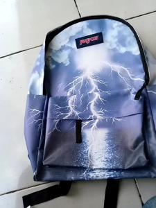 tas jansport awan petir dengan motif keren dan kekinian .tas ransel jansport. pria wanita.js