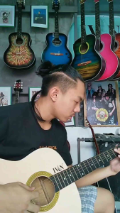 Ivans acoustic guitar ( Natural model )