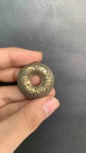 Đồng xu Om Mani Padme Hum