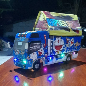 Truk oleng miniatur doraemon lampu dan terpal