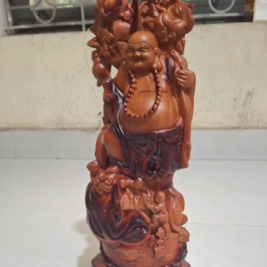 Tượng Phật Di Lặc gổng đào gỗ hương đá chạm khắc chi tiết đặt trên bệ gỗ.cao 50cmx18cmx12cm