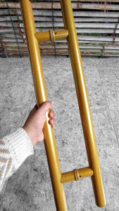 Gagang Handle pintu kaki baut tembus suling 1¼ full gold powder coating berbahan stenlistell