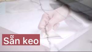 Giấy dán bếp giả vân đá tráng nhôm cách nhiệt.dài 5 mét rộng 60cm