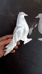 Ornamen pagar motif merpati