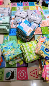 perlak bayi ukuran 65x70 motif random