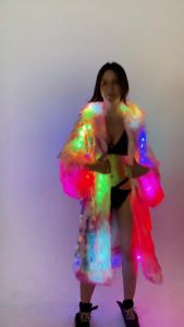 Womens LED Sequin Faux Fur Coat Long Hooded Festival & Cosplay Outfit Powered Flare Sleeves Sequin Embellished LED Lit Jacket