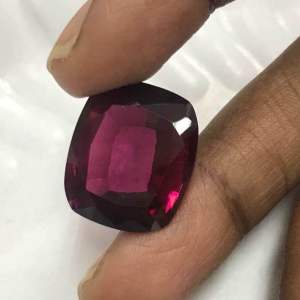 Synthetic Rodallite garnet long cushion 24.65carat