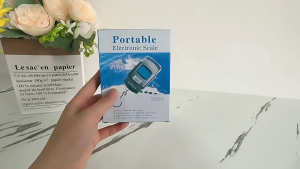 เครื่องชั่งน้ำหนักพกพาแบบดิจิตอล LCD แบบพกพา 50 กก – 10 กรัม หน้าจอแสดงผลคุณภาพสูงสำหรับเดินทางแถมถ่านพร้อมใช้งาน