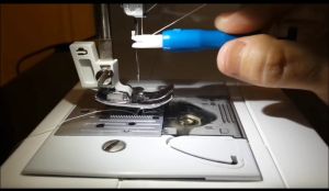 NEEDLE THREADER FOR SEWING MACHINE ATTACHED NEEDLES