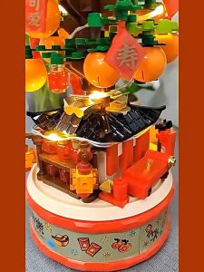 Quà Tết Bộ đồ chơi lắp ghép Lê Gô cây quýt Tết đại cát đại lợi có đèn LED hộp nhạc 8 âm Mô hình cây quýt 419/671 mảnh